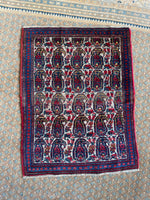 small persian vintage rug