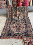 Small antique rug