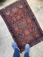 small vintage Persian rug