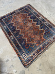 small Persian area rug