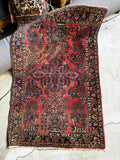 small Persian wool rug