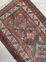 antique tribal rug
