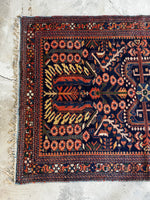 antique Persian area rug