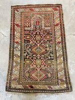 Small antique rug