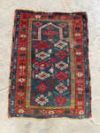 Small antique prayer rug